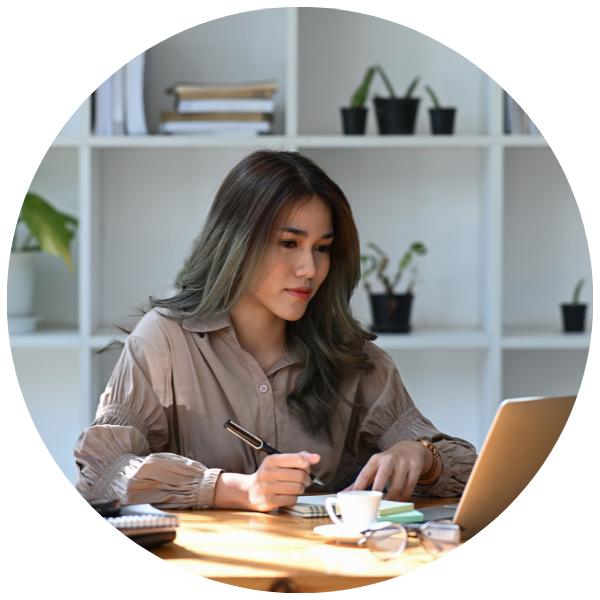 woman filling out fertility grant applications at home