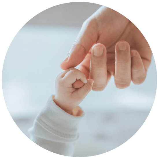 Baby grasping hand_circle