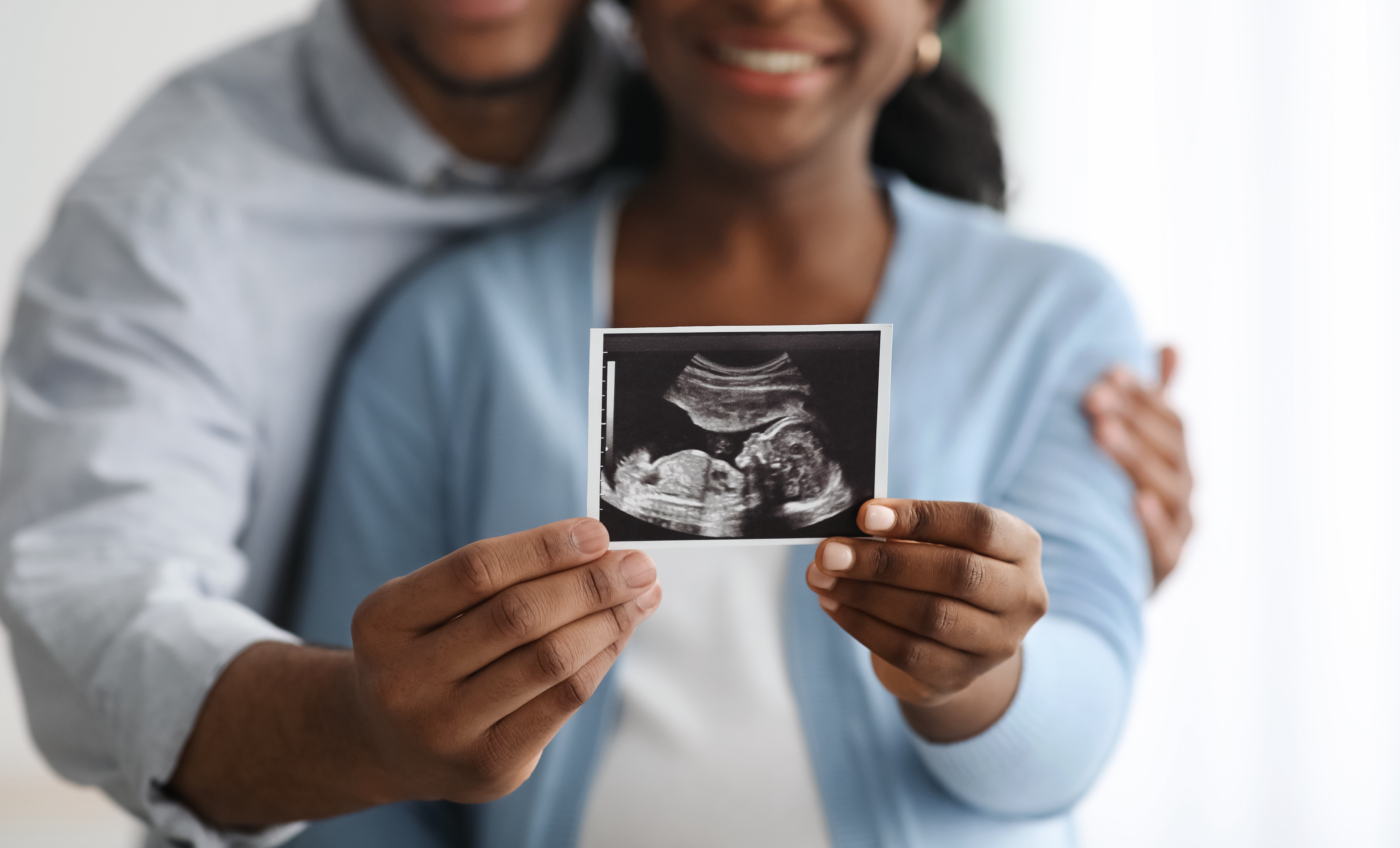 Illume Fertility close up of ultrasound photo with Black couple
