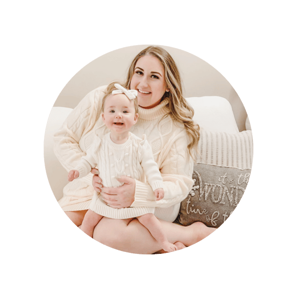 single mom holding baby girl