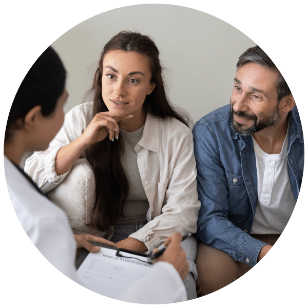Patients discussing embryo testing with a fertility doctor