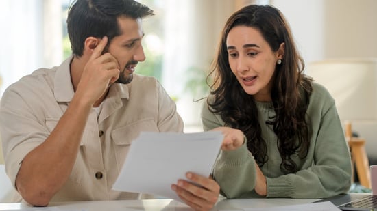 couple discussing insurance policies for ivf coverage