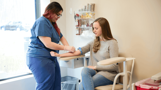 day 21 fertility testing nurse with female patient