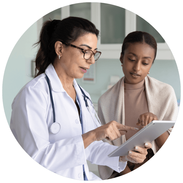 Doctor explaining AMH test results to female patient
