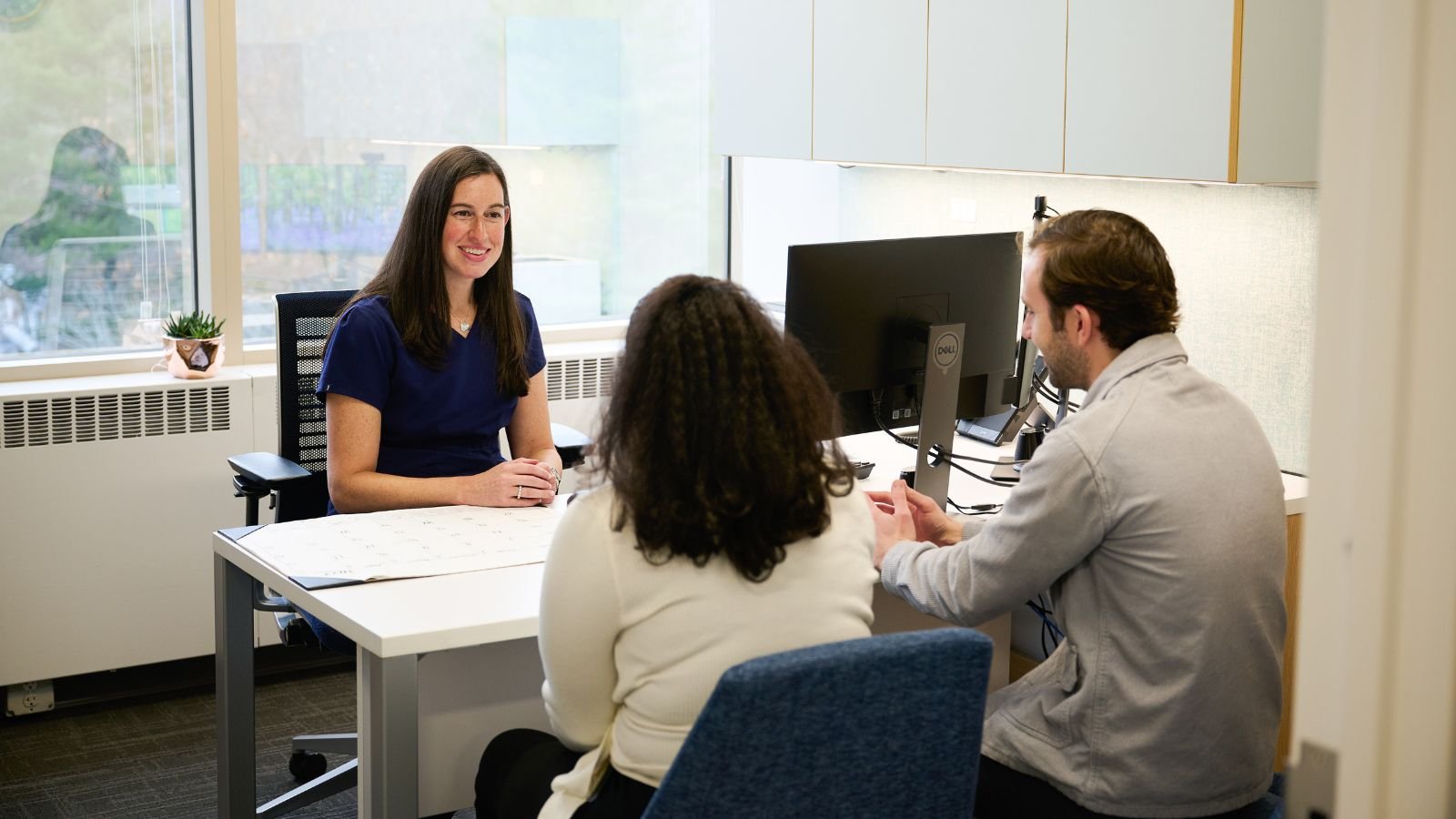 Dr. Ilana Ressler discussing preimplantation genetic testing with a patient