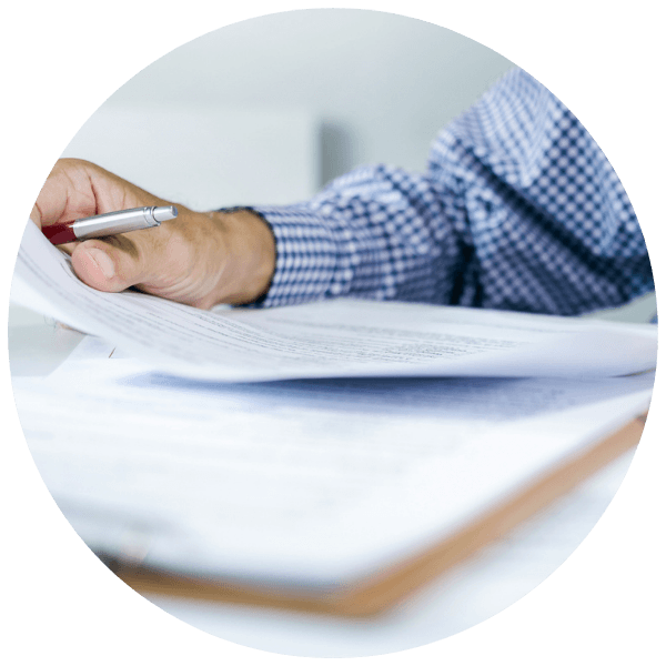 Patient reviewing insurance documents.