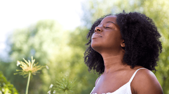 woman-meditating-outside-with-eyes-closed
