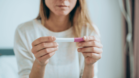 negative pregnancy test sad woman 